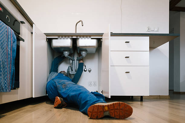 Professional Drain Cleaning technician working in Franklin, NH